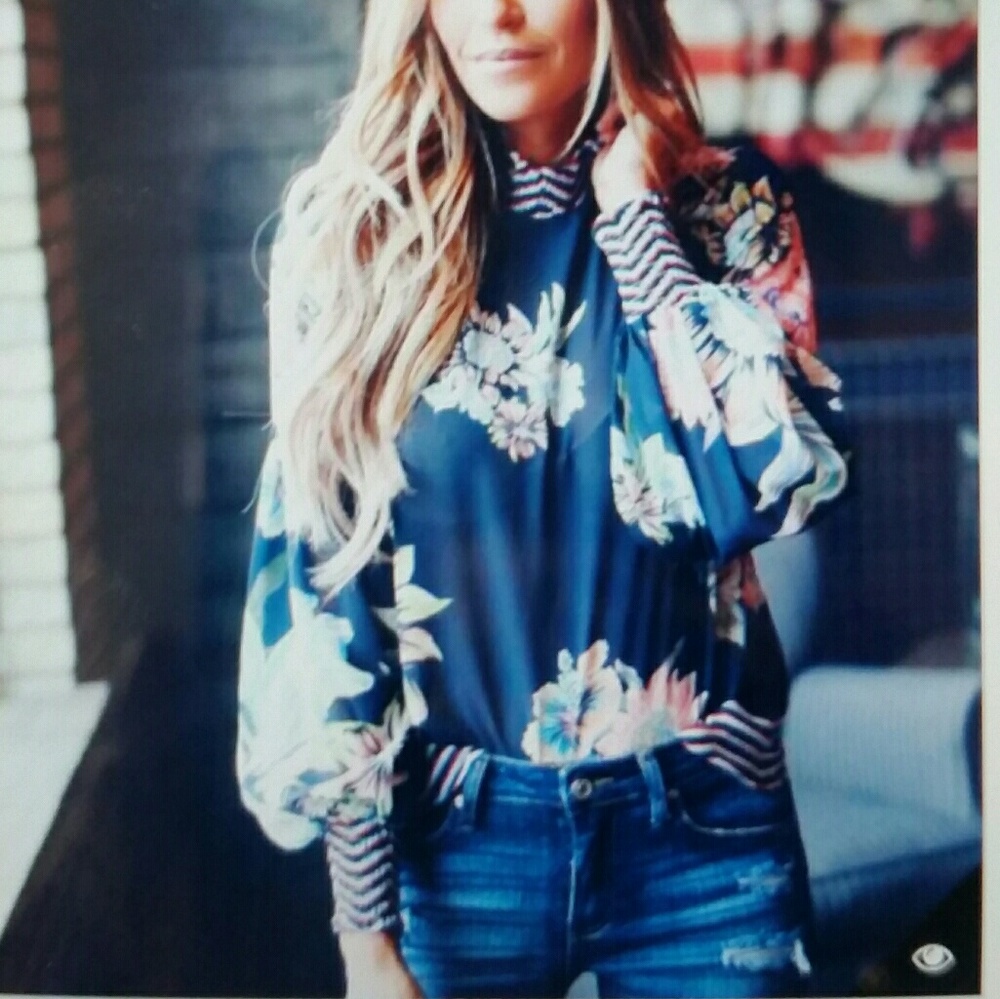 NWOT Navy blue floral blouse.
